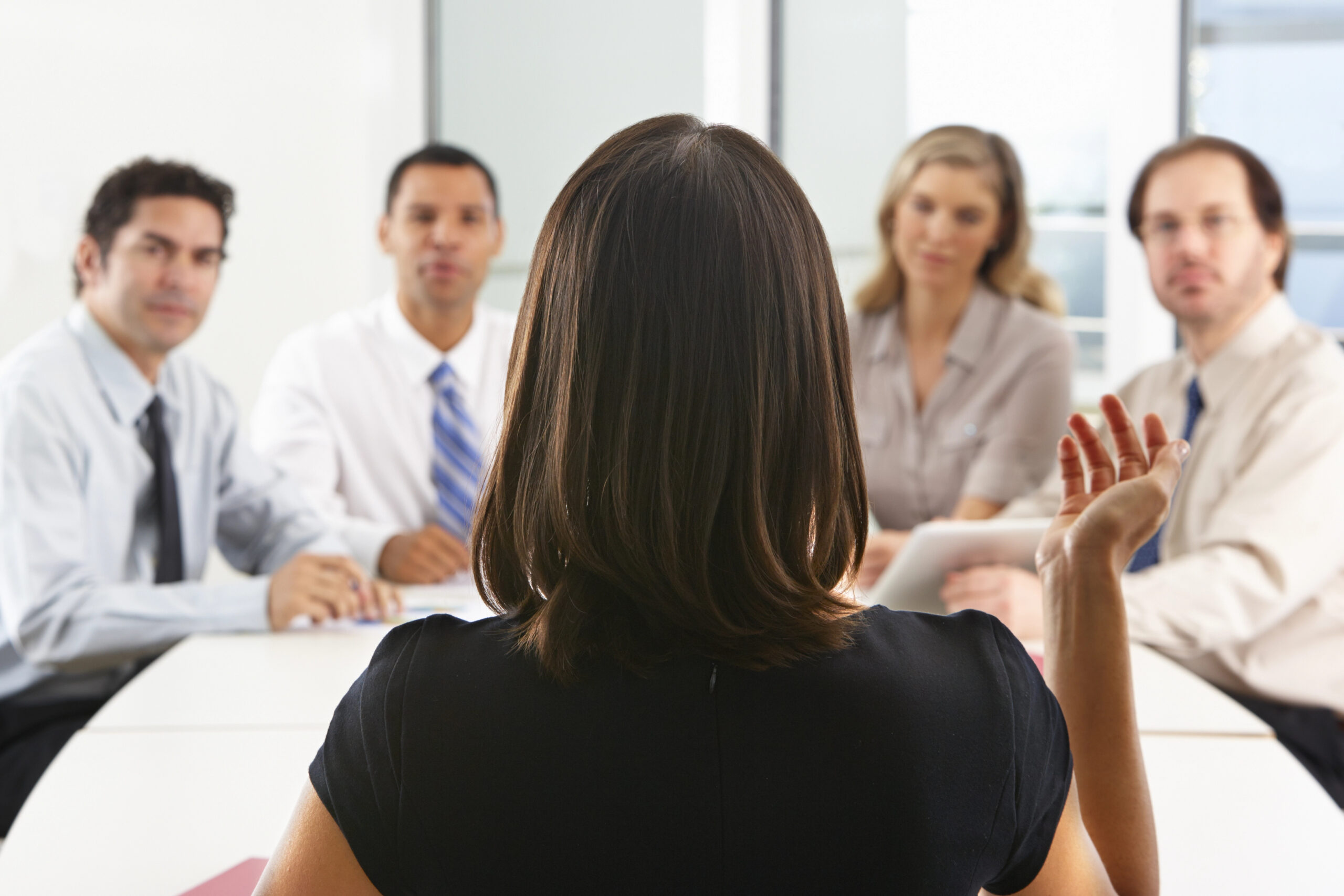 woman apologizing at work